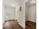 Inviting foyer with a stylish front door, a nearby powder room, and elegant flooring setting a warm tone at 1248 Falling Water Se Dr, Smyrna, GA 30080