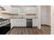 Efficient kitchen with stainless steel appliances, ample cabinet space, and stylish countertops for meal preparation at 1248 Falling Water Se Dr, Smyrna, GA 30080