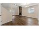 Spacious living room with vaulted ceilings, fireplace, natural light, and wood floors for relaxation at 1248 Falling Water Se Dr, Smyrna, GA 30080