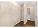 Walk-in closet with ample storage space and wood-look flooring at 1248 Falling Water Se Dr, Smyrna, GA 30080