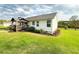 Spacious backyard featuring a covered deck, perfect for outdoor entertaining at 273 Crowe Springs Nw Rd, Cartersville, GA 30121