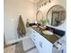 Elegant bathroom with double sinks, granite countertops, and decorative mirrors at 273 Crowe Springs Nw Rd, Cartersville, GA 30121