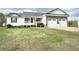 Charming home with a metal roof, stone accents, and a well-manicured lawn at 273 Crowe Springs Nw Rd, Cartersville, GA 30121