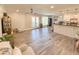 Open-concept living room with wood flooring and French doors at 273 Crowe Springs Nw Rd, Cartersville, GA 30121