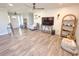 Bright living room with hardwood floors, modern furniture, and ample natural light at 273 Crowe Springs Nw Rd, Cartersville, GA 30121