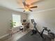 Functional home office with a desk, chair, and exercise equipment at 273 Crowe Springs Nw Rd, Cartersville, GA 30121
