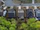 Aerial view of a residential neighborhood with well-maintained homes and yards, showcasing community layout and landscaping at 3455 Buffington Ln, Cumming, GA 30040