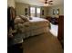 Comfortable bedroom featuring a decorative bed, ceiling fan, and ample natural light at 3455 Buffington Ln, Cumming, GA 30040