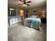 Cozy bedroom with a decorative bed, mirror, and ceiling fan at 3455 Buffington Ln, Cumming, GA 30040