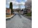 Gated entrance to community with brick pillars at 3455 Buffington Ln, Cumming, GA 30040