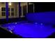 Illuminated hot tub at night near screened porch at 3455 Buffington Ln, Cumming, GA 30040