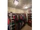 Spacious walk-in closet featuring custom shelving and stylish lighting for organized storage at 3455 Buffington Ln, Cumming, GA 30040