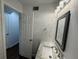 Stylish bathroom featuring modern fixtures, a vanity with granite countertop, and updated lighting at 995 Litchfield Pl, Roswell, GA 30076