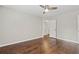 Bedroom features wood floors, neutral walls, and ceiling fan at 995 Litchfield Pl, Roswell, GA 30076