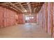 Unfinished basement with insulated walls and concrete floor at 3080 Dickson Ne St, Brookhaven, GA 30319