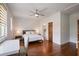 The bedroom features hardwood floors and is brightly lit with two windows at 3080 Dickson Ne St, Brookhaven, GA 30319
