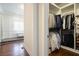 This closet has custom shelves with shirts, pants, and shoes for storage at 3080 Dickson Ne St, Brookhaven, GA 30319