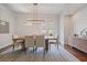 Inviting dining room with hardwood floors, contemporary chandelier, and decorative decor at 3080 Dickson Ne St, Brookhaven, GA 30319