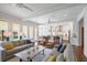 Open-concept living room boasting ample seating, hardwood floors, and seamless flow to the kitchen at 3080 Dickson Ne St, Brookhaven, GA 30319