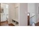 Mudroom features bench, storage baskets, coat hooks and leads to a half-bathroom at 3080 Dickson Ne St, Brookhaven, GA 30319