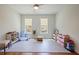 Spacious playroom with hardwood floors, lots of natural light, and neutral paint at 3080 Dickson Ne St, Brookhaven, GA 30319
