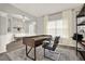 Stylish home office with modern desk, comfortable chair, and elegant decor, designed for productivity at 6675 Flagstone Ct, Cumming, GA 30028