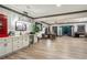 Finished basement features custom bar with beverage center and an open floor plan at 2940 W Village Dr # 60, Suwanee, GA 30024