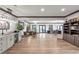 Expansive finished basement includes custom bar area, workspace, and ample storage at 2940 W Village Dr # 60, Suwanee, GA 30024