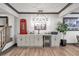 Finished basement with custom bar, mini fridge, modern lighting, and a unique design at 2940 W Village Dr # 60, Suwanee, GA 30024