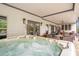Relaxing hot tub on the patio with nearby dining and seating areas at 2940 W Village Dr # 60, Suwanee, GA 30024