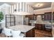 Modern kitchen area with sleek countertops and stainless steel appliances at 2940 W Village Dr # 60, Suwanee, GA 30024