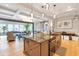 Spacious kitchen featuring a large island and seamless access to the living area at 2940 W Village Dr # 60, Suwanee, GA 30024