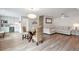 Open-concept living room featuring a dining area, kitchenette, and comfortable seating at 2940 W Village Dr # 60, Suwanee, GA 30024