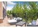 Inviting outdoor patio with comfortable seating and landscaping, perfect for enjoying the outdoors at 2940 W Village Dr # 60, Suwanee, GA 30024