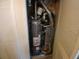 View of the water heater and furnace, both conveniently located inside the home at 3011 Canyon Point Cir, Roswell, GA 30076