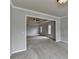 Bedroom featuring plush carpeting and large windows at 10460 Cranchester Way, Alpharetta, GA 30022