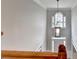 High-ceiling foyer with front door and a stylish pendant light at 10460 Cranchester Way, Alpharetta, GA 30022