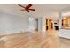 Expansive living area offering access to the kitchen and stairs, ideal for entertaining guests at 10460 Cranchester Way, Alpharetta, GA 30022
