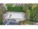 Overhead shot of covered community pool area with lounge chairs and lush greenery at 10460 Cranchester Way, Alpharetta, GA 30022