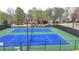 Enjoy a match on the community's meticulously maintained, brightly colored tennis courts at 10460 Cranchester Way, Alpharetta, GA 30022