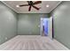 Bonus room featuring a fan, recessed lighting, and a blue painted room in view at 1924 Wilkenson Xing, Marietta, GA 30066
