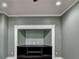 Bonus room featuring a fan, recessed lighting, and a built-in display with shelving at 1924 Wilkenson Xing, Marietta, GA 30066
