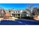 Exterior view of the community clubhouse with brick and siding details at 1924 Wilkenson Xing, Marietta, GA 30066