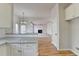 Open kitchen area flows into a living space with views of the backyard at 1924 Wilkenson Xing, Marietta, GA 30066