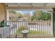 Balcony with a view of the parking lot and lush trees at 3155 Seven Pines Ct # 303, Atlanta, GA 30339