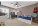 Comfortable bedroom features a daybed and a ceiling fan at 3155 Seven Pines Ct # 303, Atlanta, GA 30339