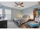 A beautifully designed bedroom with a ceiling fan and natural lighting at 3155 Seven Pines Ct # 303, Atlanta, GA 30339