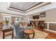 A comfortable seating area inside the Club House with a sofa and bookcases at 3155 Seven Pines Ct # 303, Atlanta, GA 30339