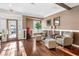Cozy area in the Club House featuring chairs, ottomans, and a decorative tree at 3155 Seven Pines Ct # 303, Atlanta, GA 30339