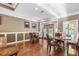 A well-lit room in the Club House with multiple tables and a wooden floor at 3155 Seven Pines Ct # 303, Atlanta, GA 30339